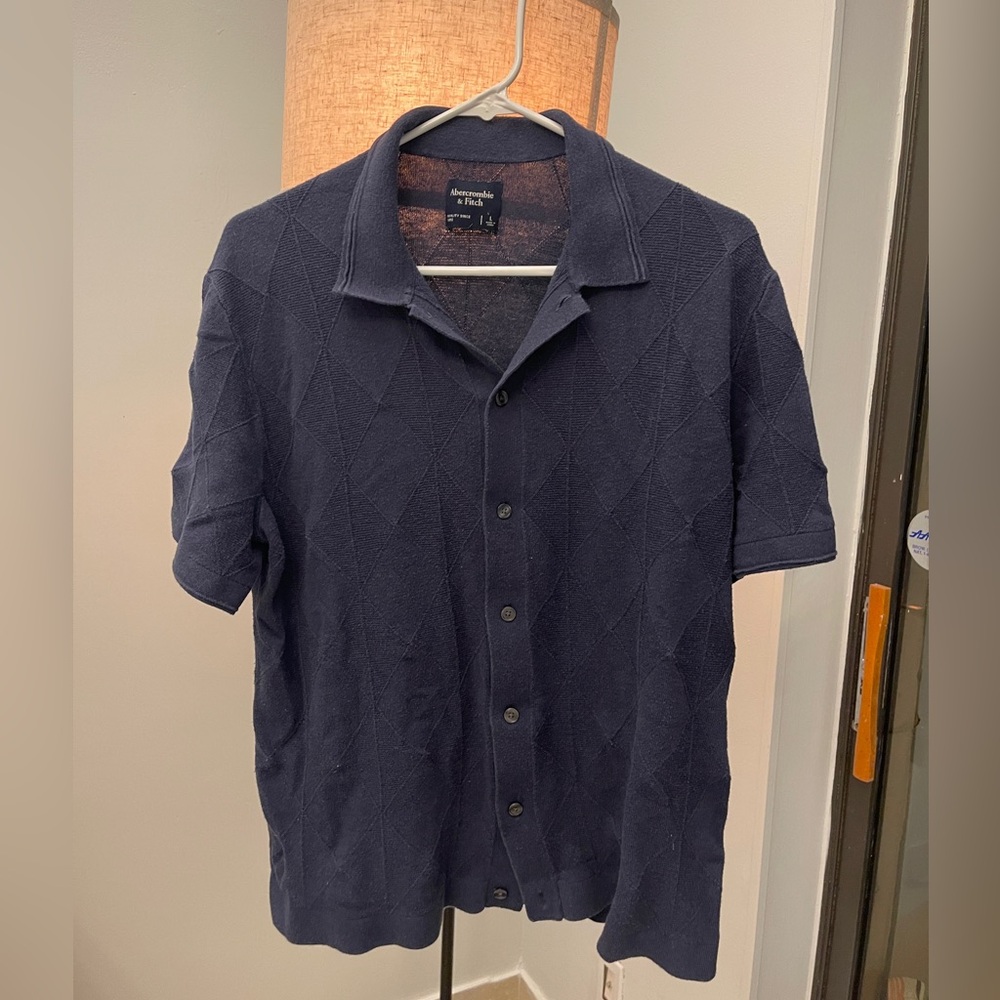 Abercrombie and Fitch size L fit like S!! Definitely shrunk and feels like a S